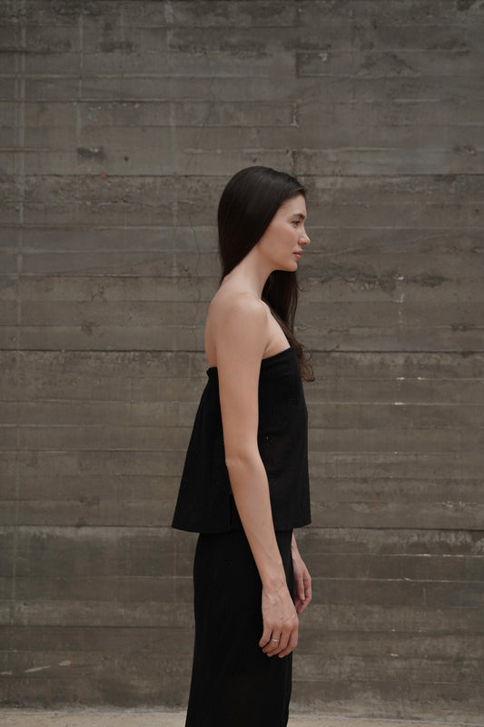 Bandeau Top Lace — side profile, concrete wall