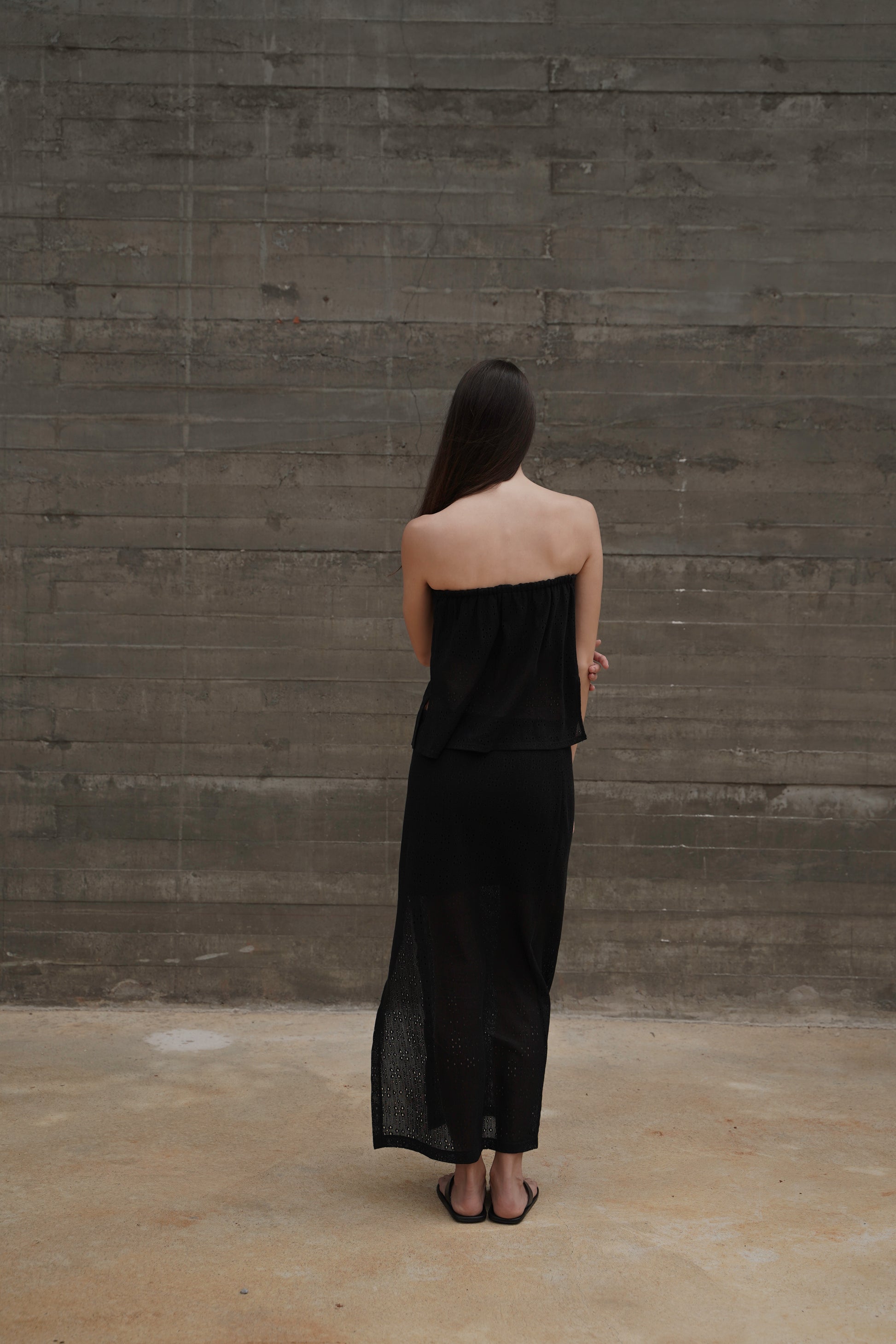 Bandeau Top Lace — back view, concrete wall