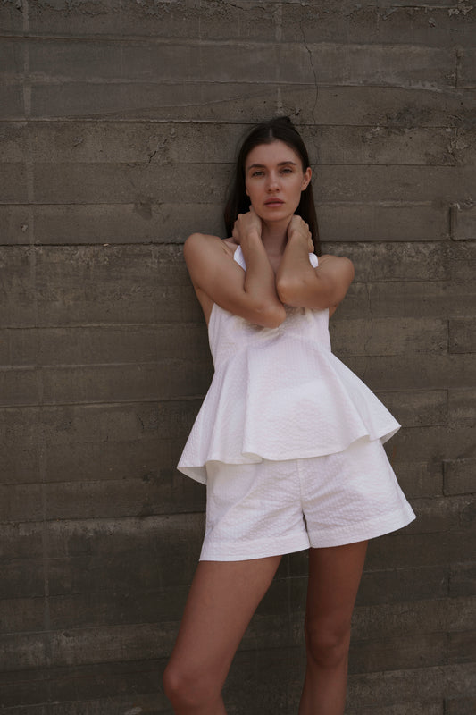Full body shot, model with arms crossed